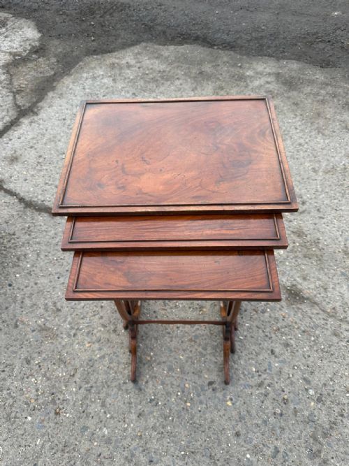 A NEST OF THREE VICTORIAN WALNUT TABLES - ADDITIONAL PHOTO 3