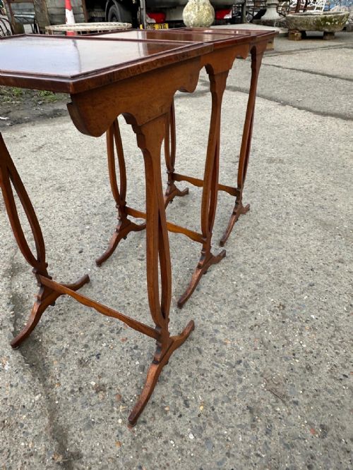 A NEST OF THREE VICTORIAN WALNUT TABLES - ADDITIONAL PHOTO 6