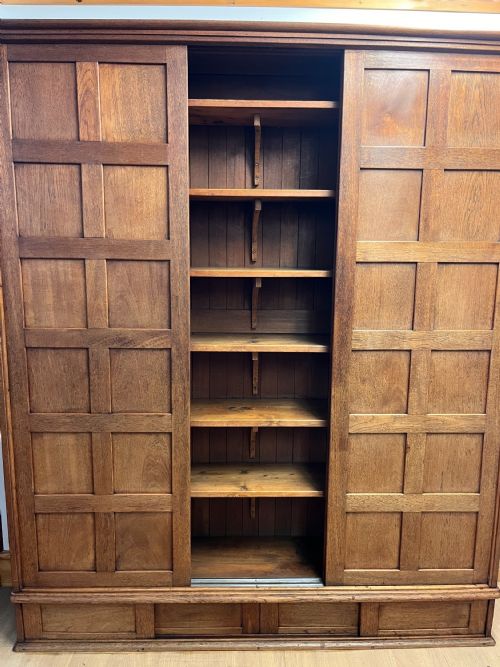 CIRCA 1900 LARGE TEAK SHELVED CUPBOARD WITH SLIDING DOORS - ADDITIONAL PHOTO 6
