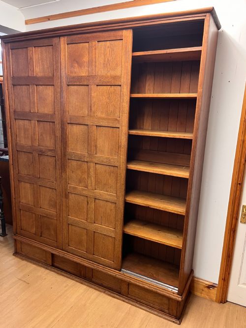 CIRCA 1900 LARGE TEAK SHELVED CUPBOARD WITH SLIDING DOORS - ADDITIONAL PHOTO 7