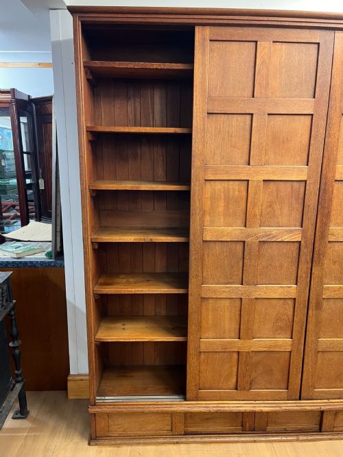 CIRCA 1900 LARGE TEAK SHELVED CUPBOARD WITH SLIDING DOORS - ADDITIONAL PHOTO 8