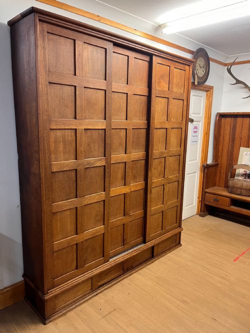CIRCA 1900 LARGE TEAK SHELVED CUPBOARD WITH SLIDING DOORS - ADDITIONAL PHOTO 9