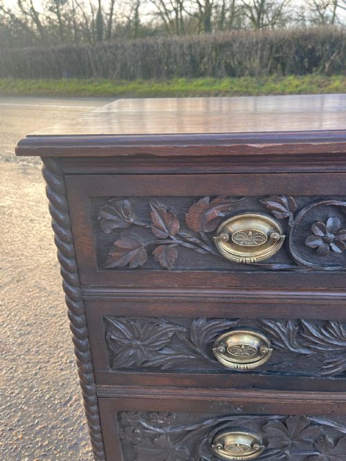 CIRCA 1900 HAND CARVED OAK 23 CHEST OF DRAWERS - ADDITIONAL PHOTO 1