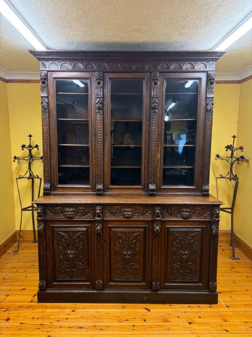 19TH CENTURY VICTORIAN MONUMENTAL CARVED OAK LIBRARY BOOKCASE WITH INTRICATE CARVINGS - ADDITIONAL PHOTO 2