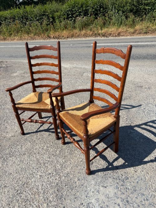 Pair of C19th Lancashire Ladderback Oak Carvers/ Armchairs with Rush Seats