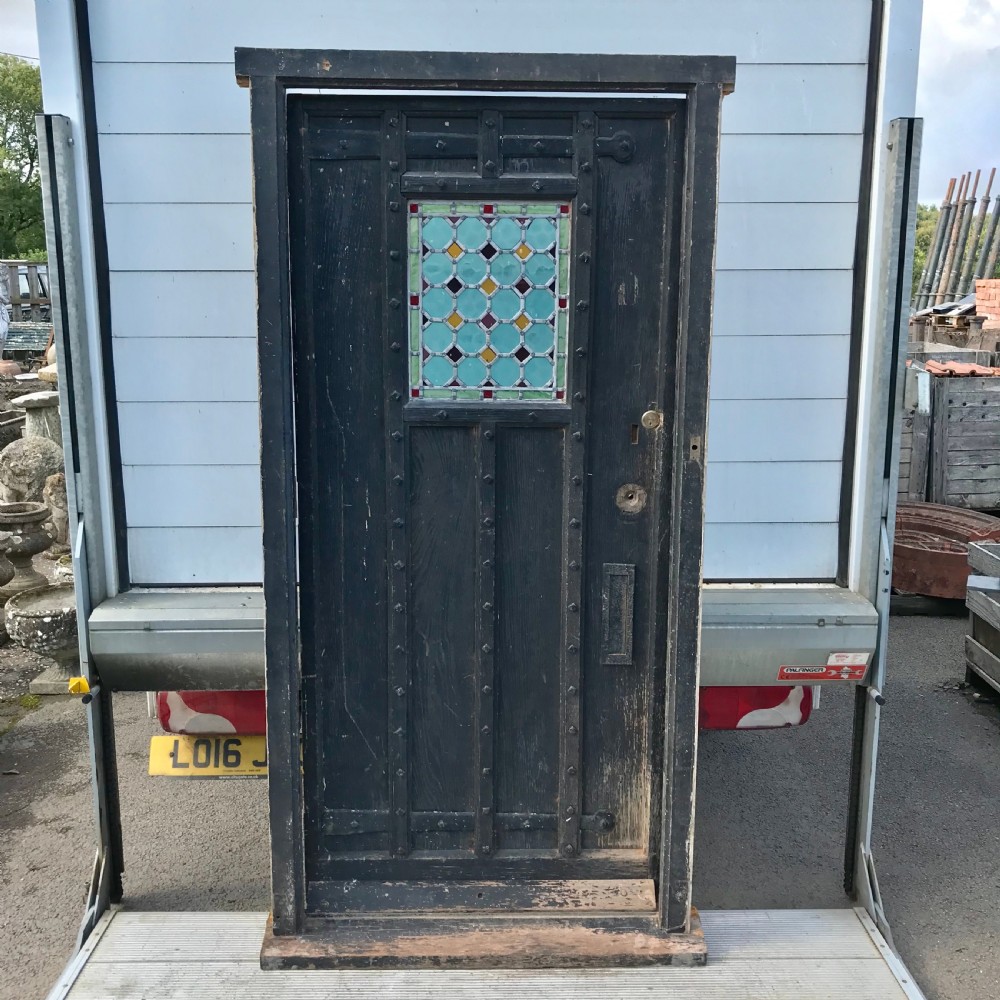 Circa 1900 Oak Door Complete with Original Frame and with Iron Hinges and Lead Light Panel 