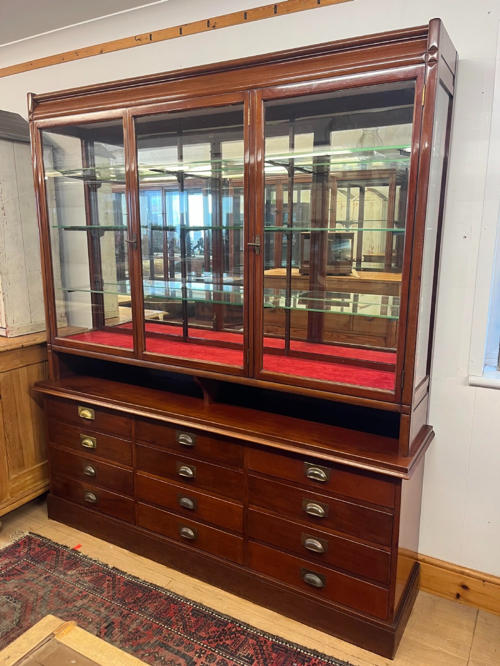 1930s E. Pollard & Co. Ltd. Mahogany Shop Display Cabinet with Drawers to Base 