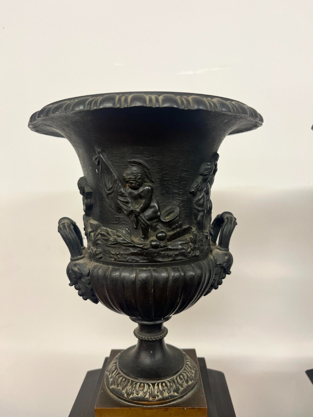 A Pair of Bronze Urns on Marble Plinths View V