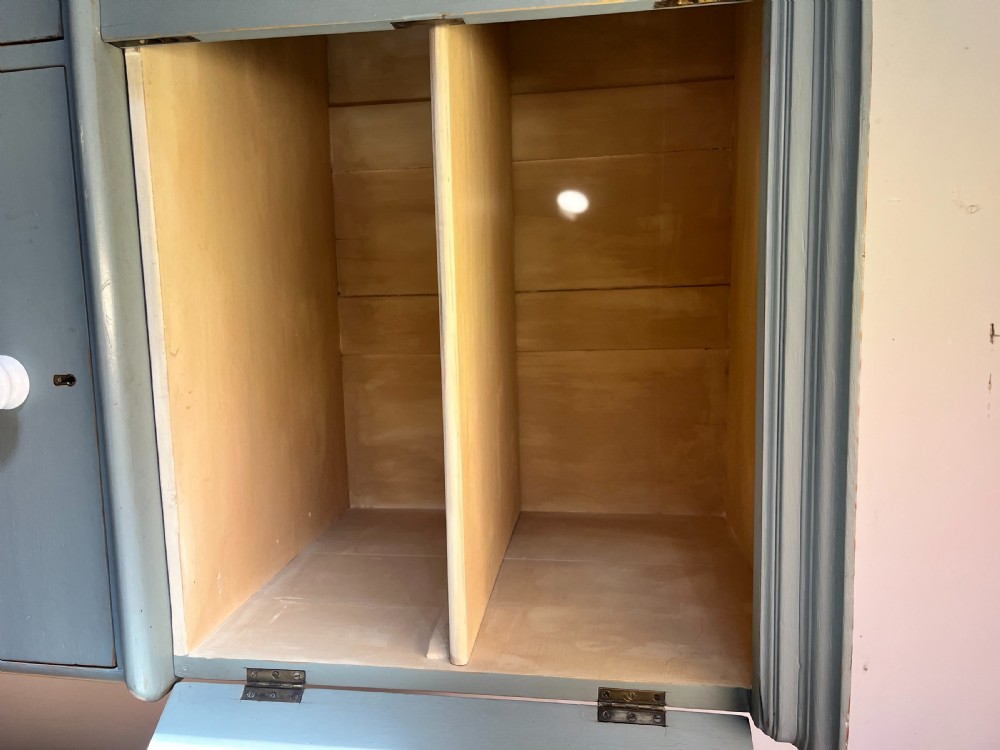 A tall Victorian painted pine linen cupboard featuring a top double-door cupboard set above five drawers with white turned handles. View VIII