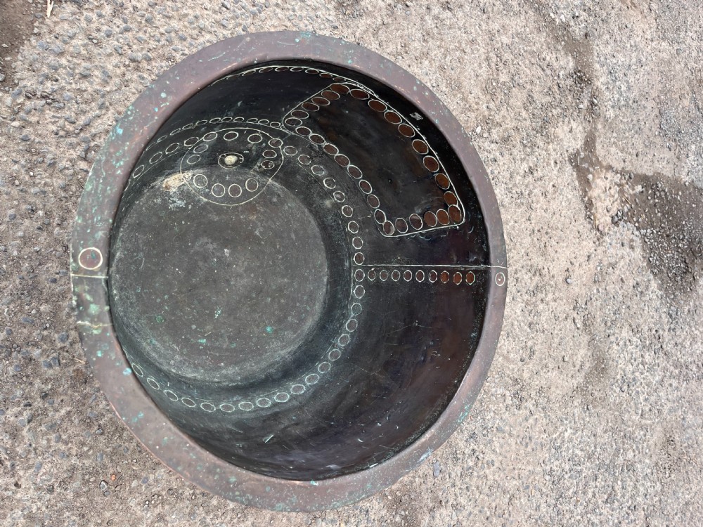 A large 19th-century copper wash boiler with heavy hand-hammered rivets along the seams and a dark oxidised patina. View IV