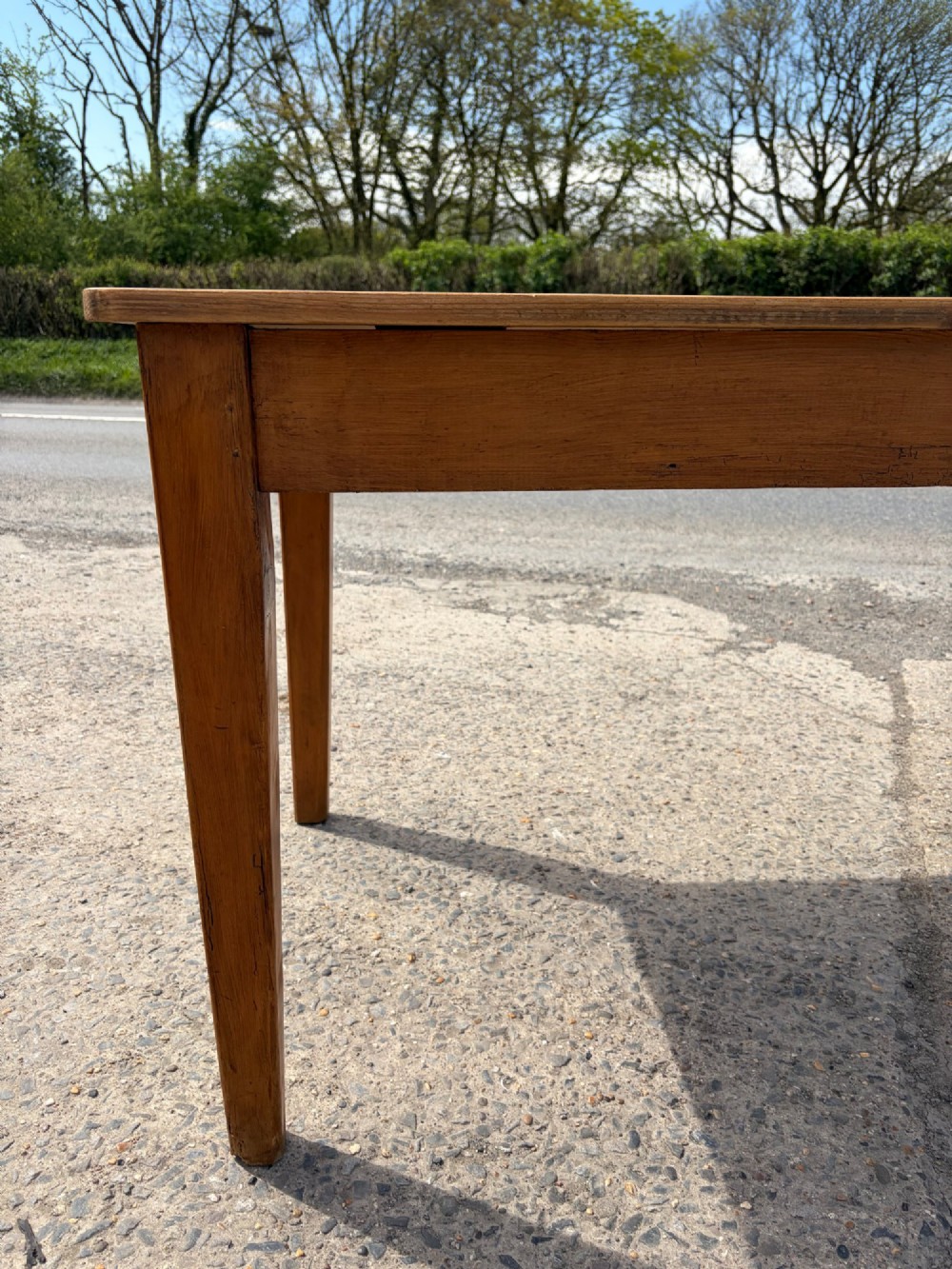 A rectangular Victorian pine table featuring four tapered square legs and a single drawer set into the front frieze. View VII