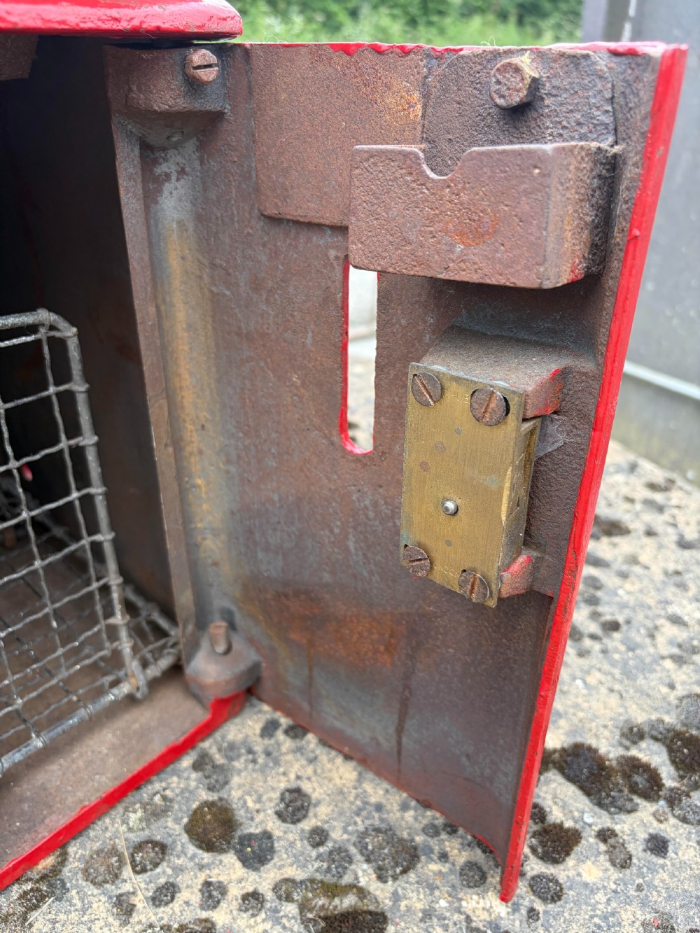 A red cast iron George V post box featuring a rounded roof, embossed text reading LETTERS ONLY, and a gold GR cipher at the base. View VIII