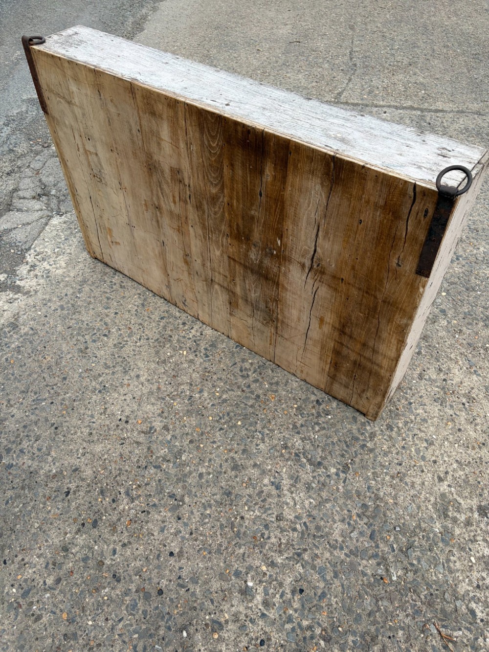 An early twentieth-century painted pine pigeon hole storage unit with a rectangular grid layout and red painted slot labels. View XI