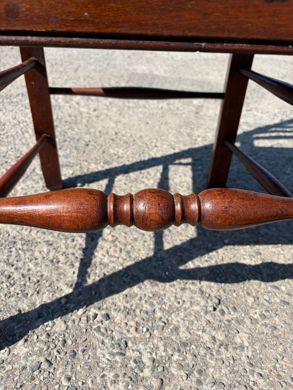 A pair of 19th-century Lancashire ladderback oak carver armchairs featuring curved back slats, turned stretchers, and hand-woven rush seats. View VIII