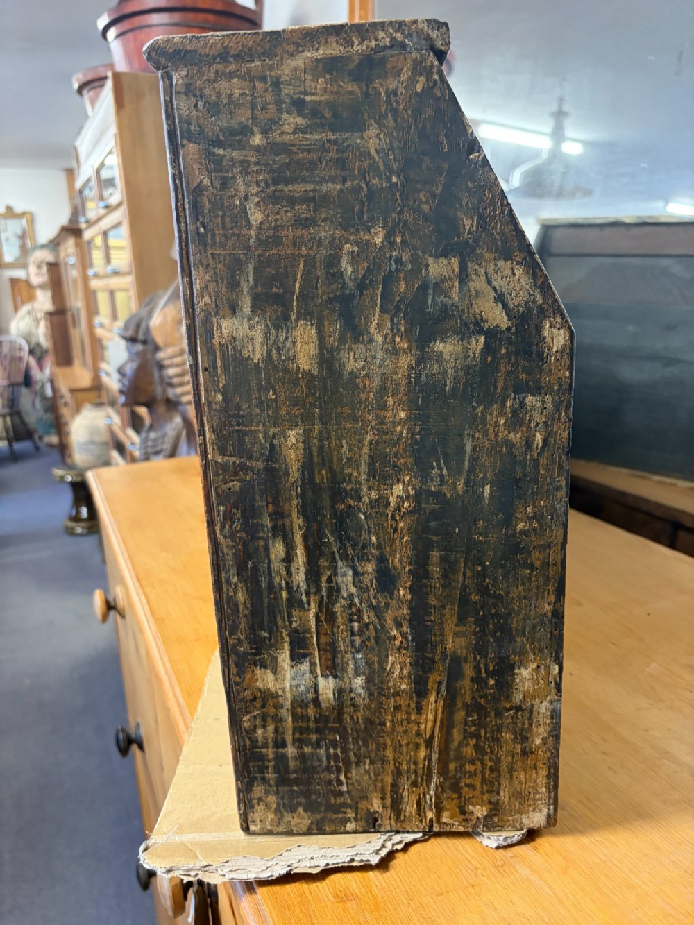 A 19th-century wooden bank of twenty-five individual drawers featuring metal ring pulls and a distressed dark finish. View V