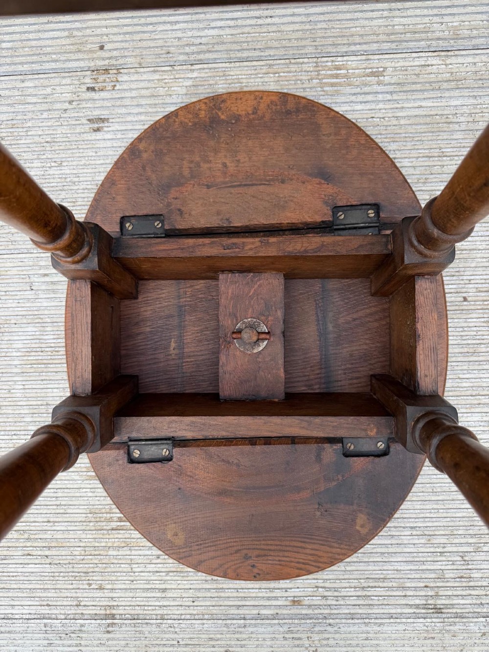 A small 1920s oak drop-leaf coffee table with turned legs and a warm brown finish. View VII