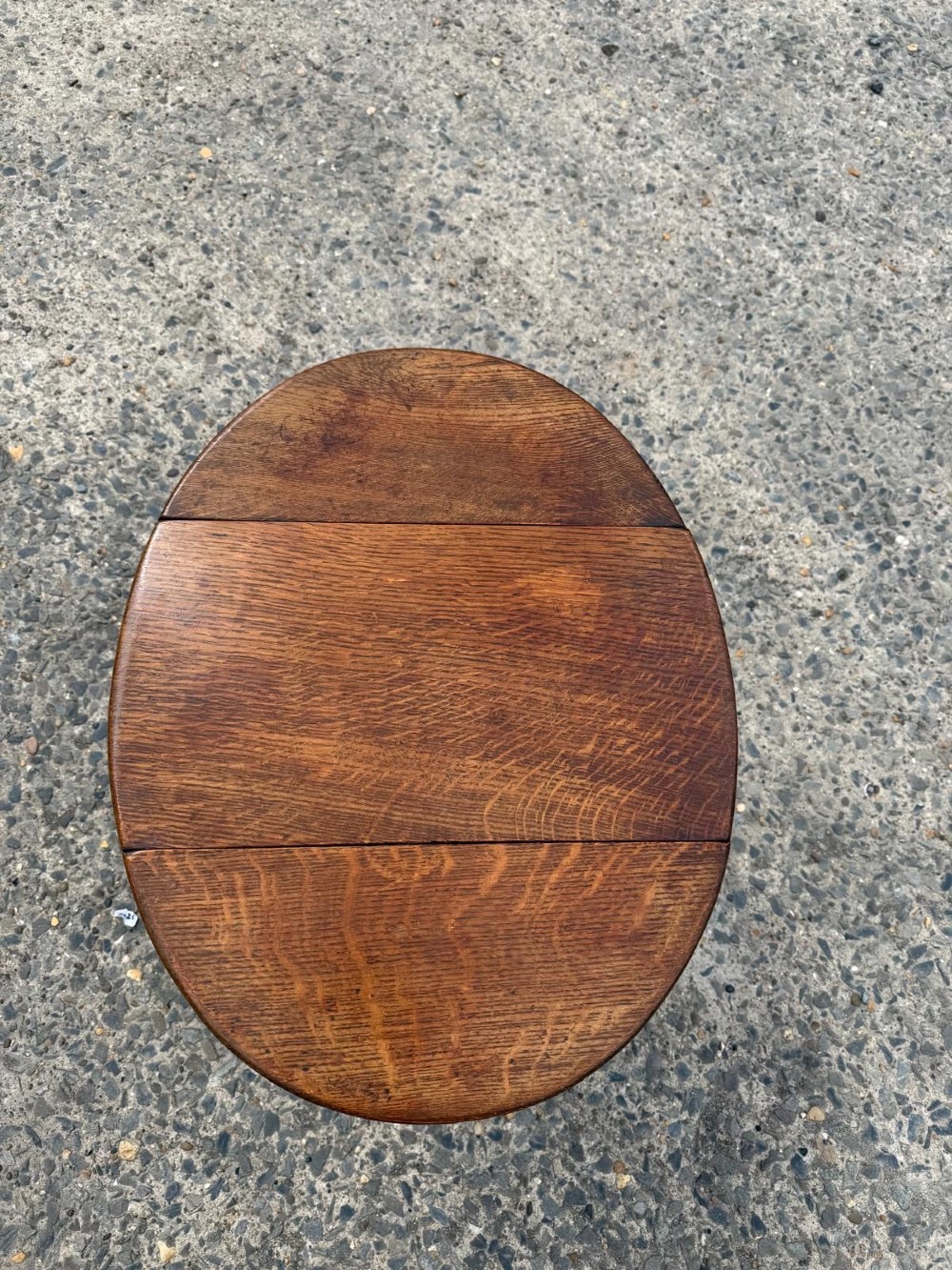 A small 1920s oak drop-leaf coffee table with turned legs and a warm brown finish. View IX