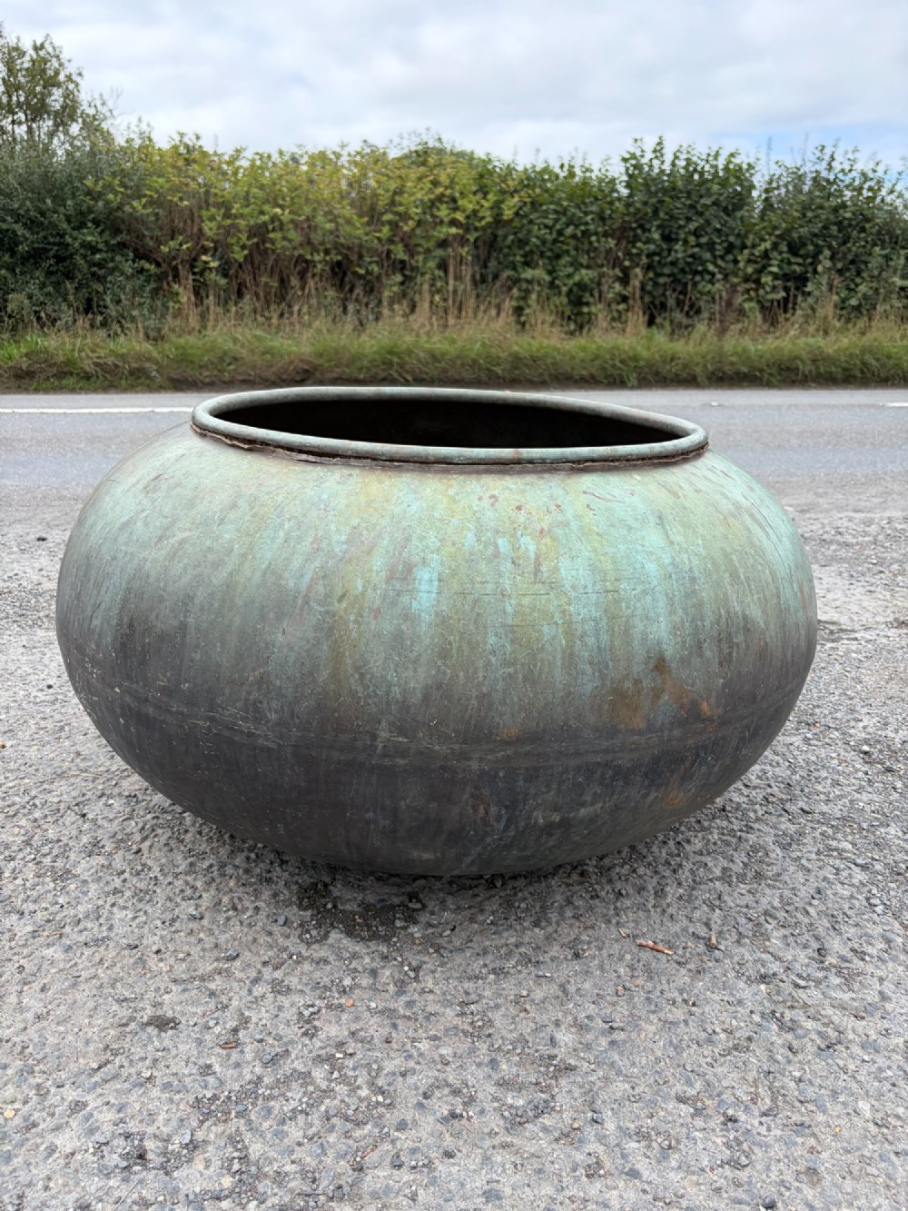 A large bulbous 19th-century copper pot featuring a rolled rim and a heavily weathered verdigris patina. View IV
