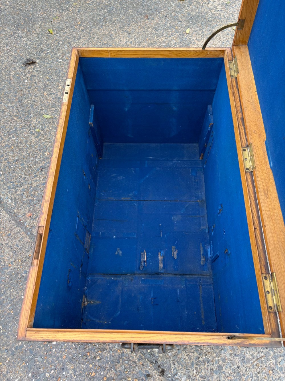 A rectangular Victorian oak silver chest with dark iron corner brackets and a brass plate set into the top lid. View III