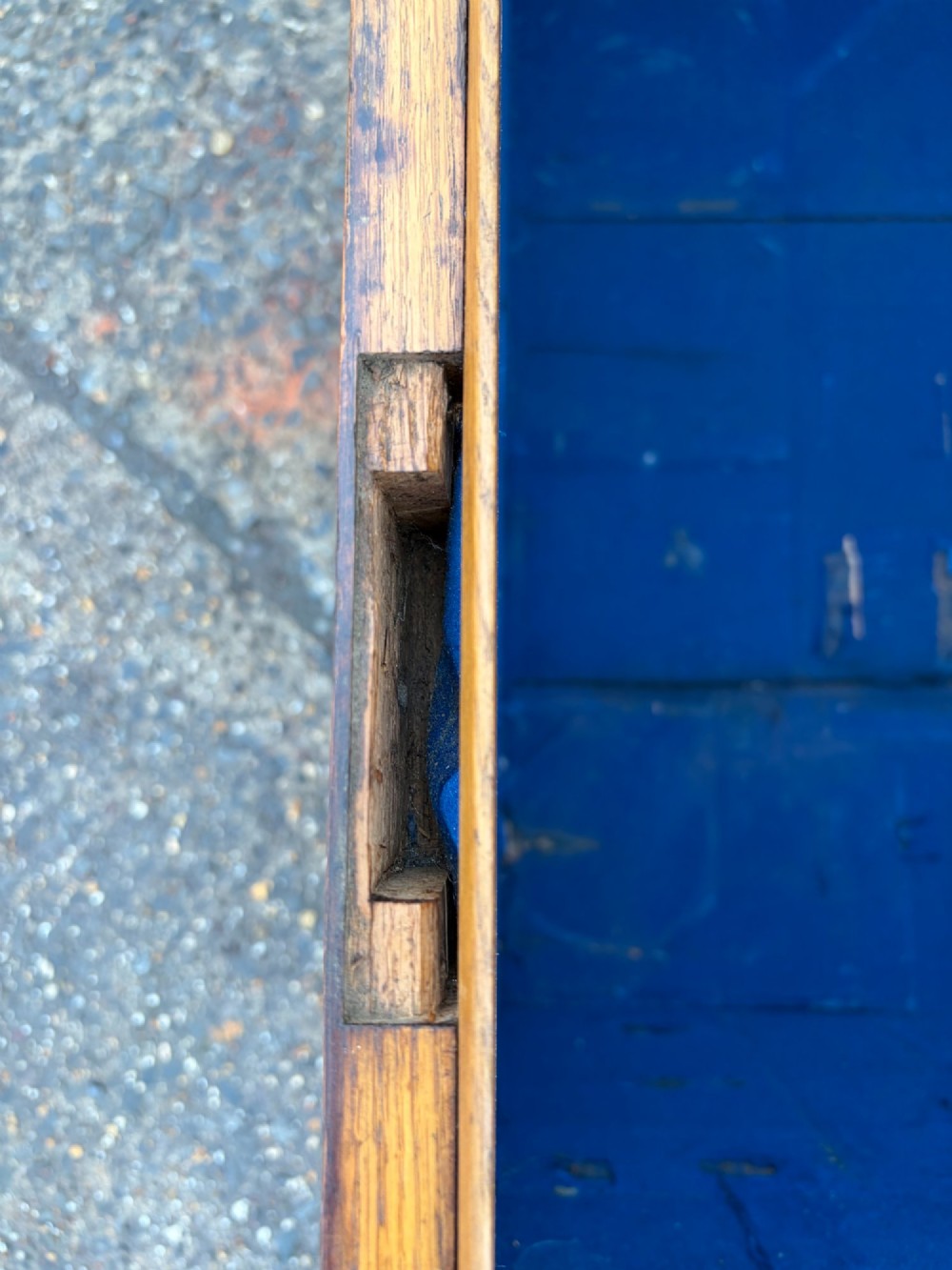A rectangular Victorian oak silver chest with dark iron corner brackets and a brass plate set into the top lid. View XIII