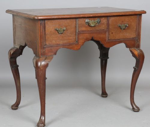 A MID 18TH CENTURY RED WALNUT LOWBOY C17501770