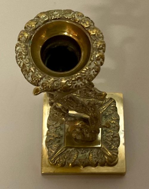 A pair of Regency gilt bronze candlesticks cast in the form of tree trunks with squirrels among the branches supporting campana sconces on square bases. View III