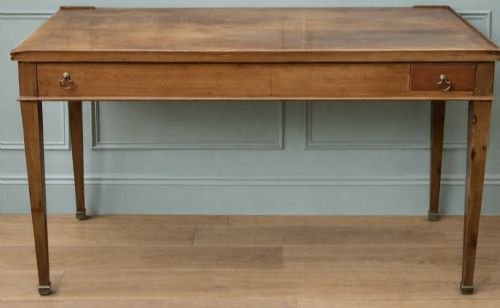 fig 1. A French Empire mahogany tric-trac games table featuring a sunken central backgammon board with inlaid points and brass eyelets around the border.