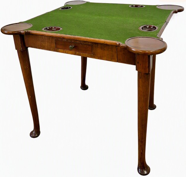 An 18th-century George III flame mahogany fold-over card table featuring projecting rounded corners, a single frieze drawer with a central metal knob, and cabriole legs with pad feet. View II