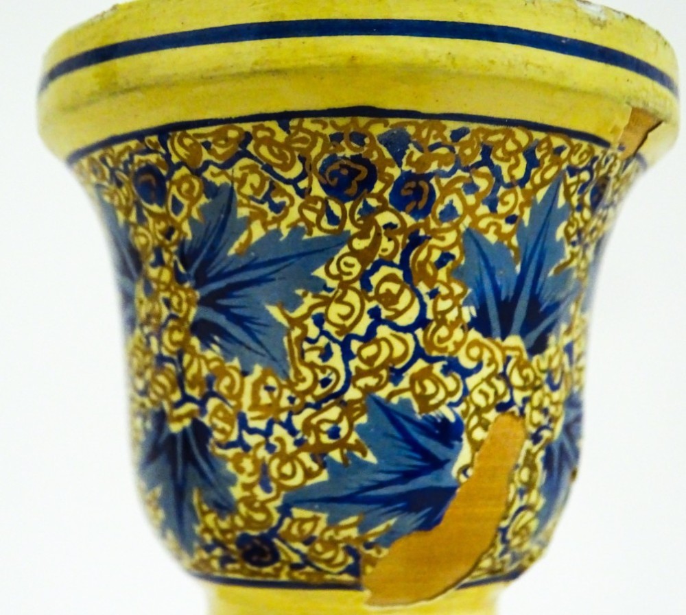 A pair of early 20th-century Kashmiri table lamps with open-spiral turned columns hand-painted in blue floral patterns on a cream lacquered ground. View VII