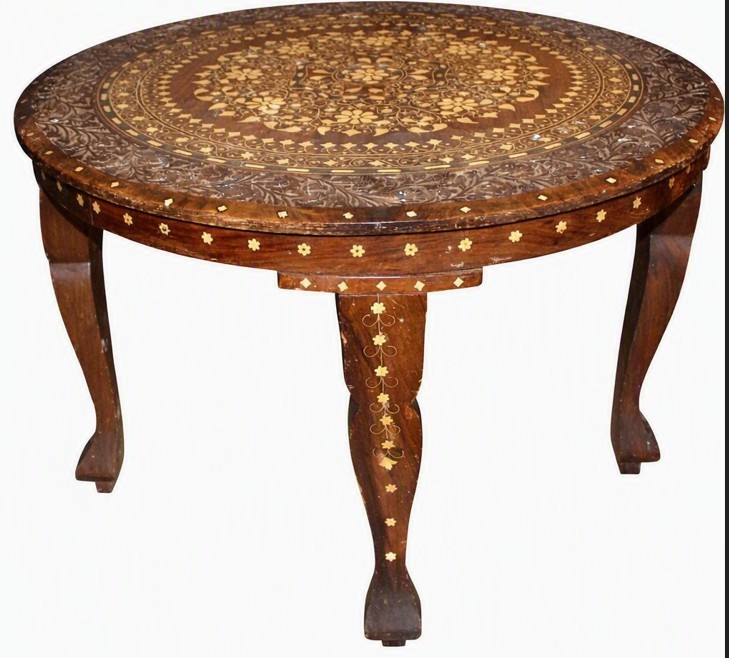 A circular dark brown wood occasional table with intricate concentric bone inlay motifs and carved cabriole legs. View II