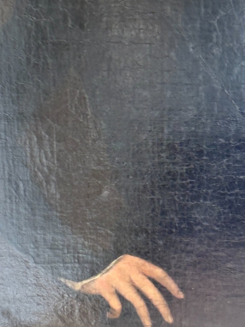 An antique oil portrait depicting a young male scholar in a dark blue coat and white collar, set in a gilded ornate frame. View IV