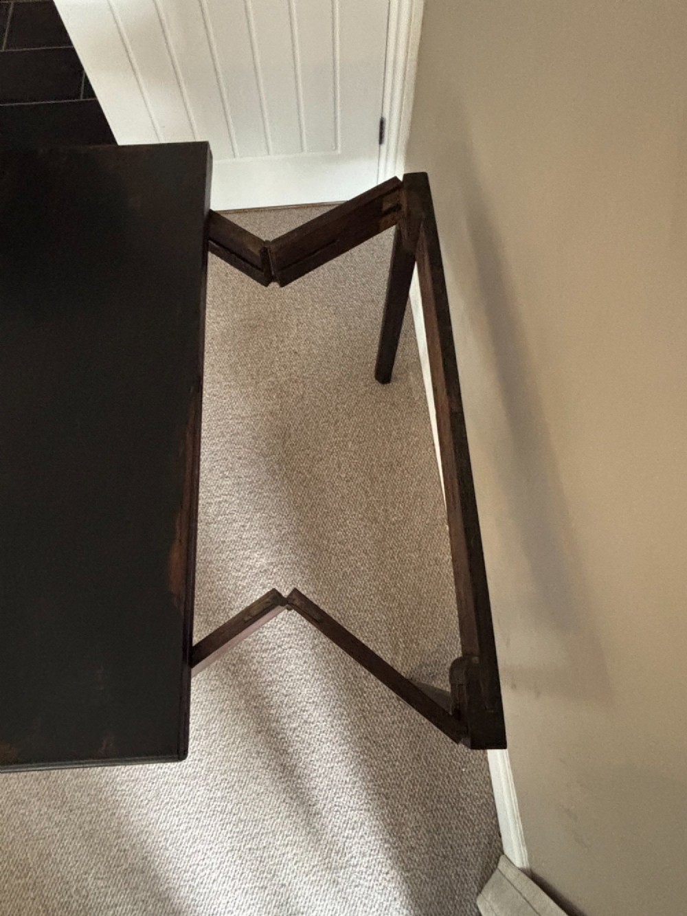 An 18th-century Chippendale mahogany card table with a rectangular fold-over top, pierced fretwork corner brackets, and straight square legs. View III