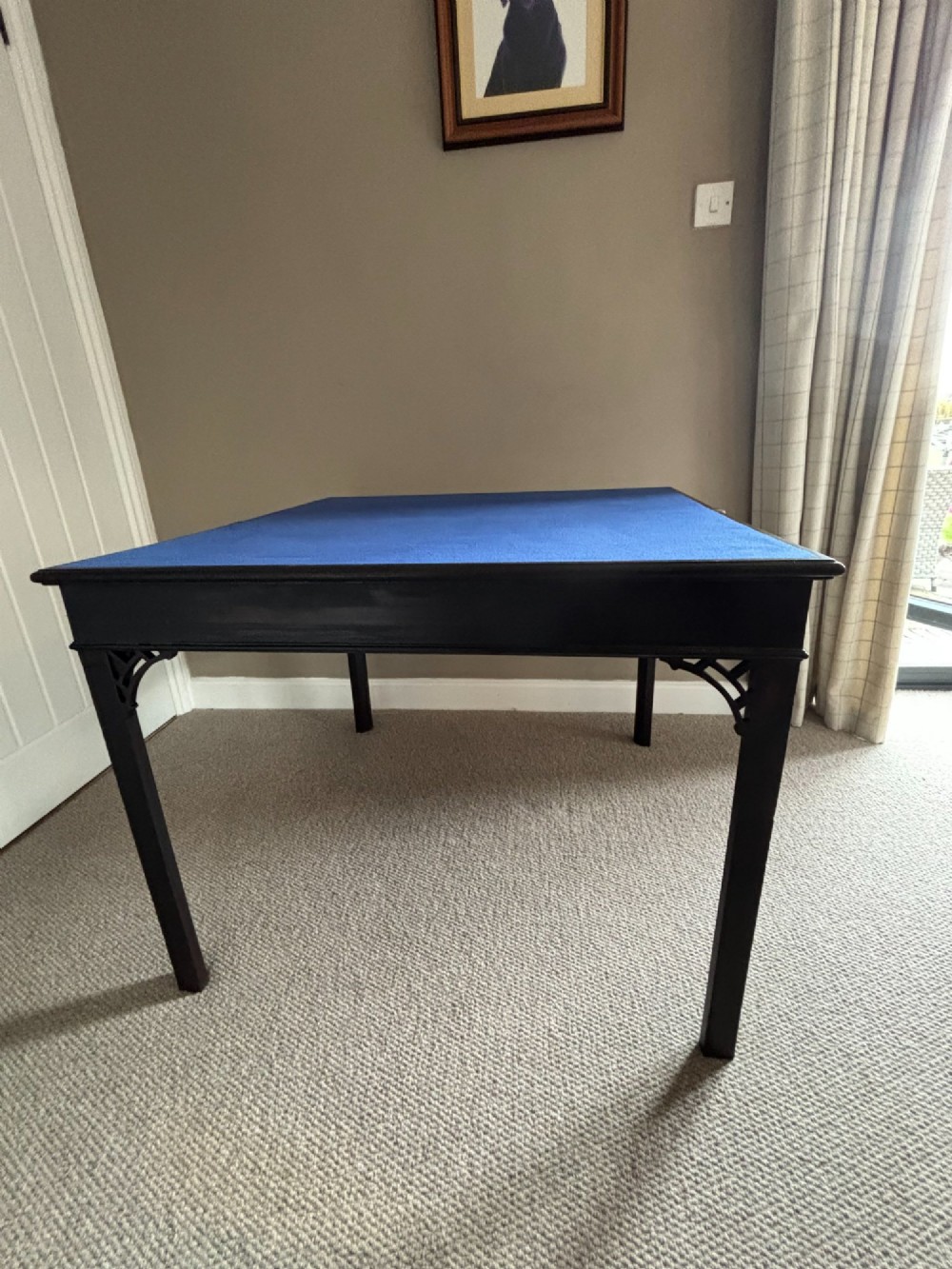 An 18th-century Chippendale mahogany card table with a rectangular fold-over top, pierced fretwork corner brackets, and straight square legs. View VII