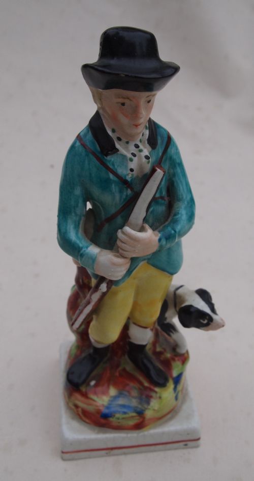 A 19th C Staffordshire Figure - The Hunter and Dog