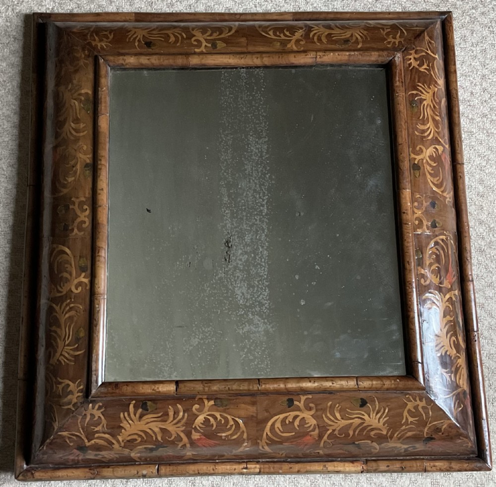 Late 17th century walnut and marquetry cushion mirror