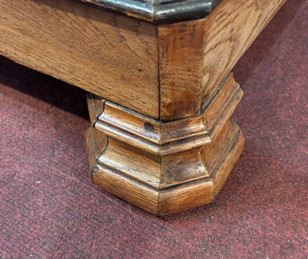 An early twentieth century French oak commode featuring three long drawers with keyhole escutcheons and a white marble top. View II