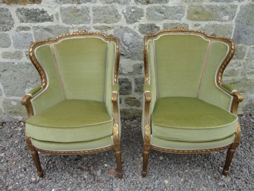 Pair of French Carved Giltwood Armchairs