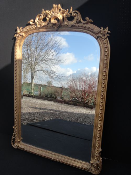 French Gilt Overmantle Mirror with Shell and Swag Cartouche.