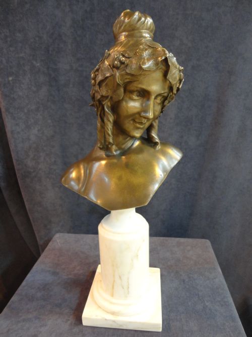 Art Nouveau Bronze Sculpture of a Female Bust Set on a Marble Plinth.
