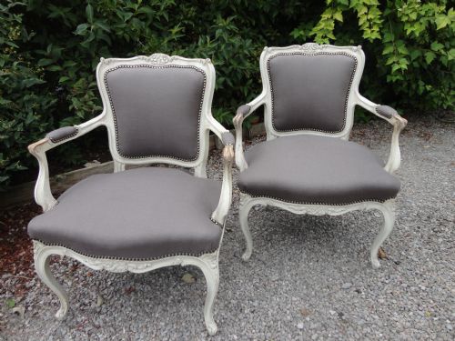 Pair of French Painted Upholstered Armchairs.