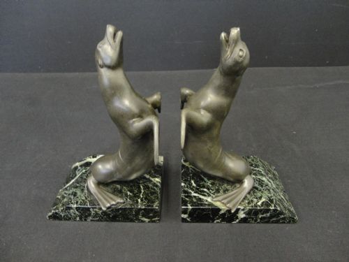 Pair of Art Deco French Spelter Sea Lion Bookends Set on Verdi Marble Base.