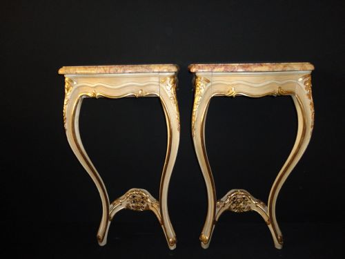 Pair of French Painted and Gilt Console Tables.