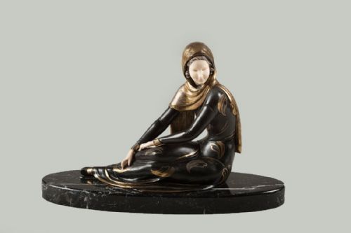 French Art Deco Spelter and Ivorine Sculpture Set on a Marble Base