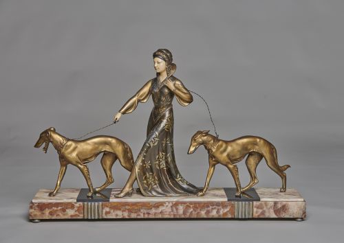 Large French Art Deco Spelter and Ivorine Sculpture of a Lady Walking Her Dogs