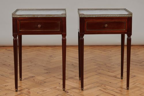 A Pair of French Mahogany Bedside Tables with Marble Tops.