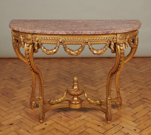 19th Century Large French Louis Xvi Style Gilt Carved Wood Console Table with a Marble Top.