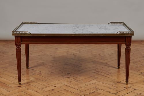 A Large French Walnut Coffee Table with Inserted Marble Top and Brass Gallery.