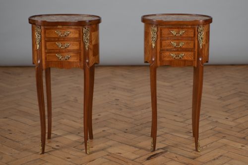 A Pair of French Three Drawer Kidney Shaped Walnut Bedside Cabinets.