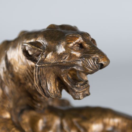 fig 1. A 19th-century patinated bronze sculpture depicting two tigers interacting on a naturalistic leaf-lined base.