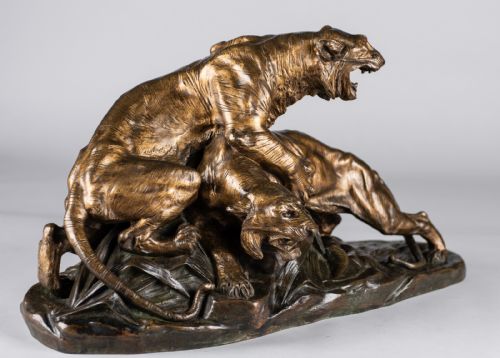 fig 2. A 19th-century patinated bronze sculpture depicting two tigers interacting on a naturalistic leaf-lined base.